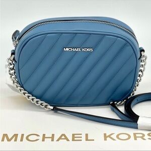 Michael Kors Rose Small Camera Bag Oval
Crossbody Sky Blue